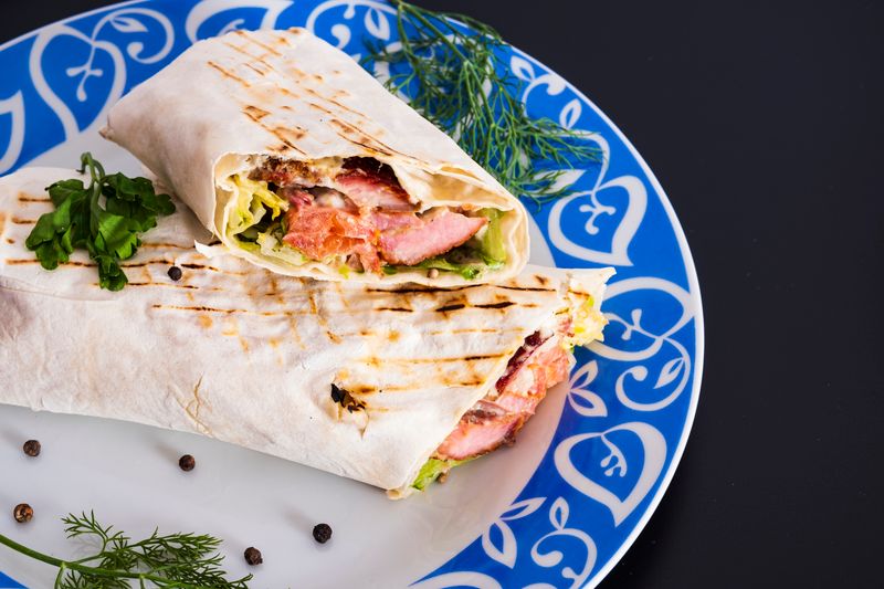 Grilled Chicken Caesar Wrap with romaine and parmesan